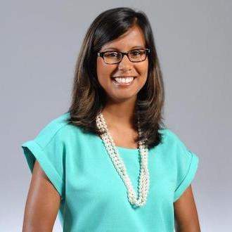 Woman smiling for camera.